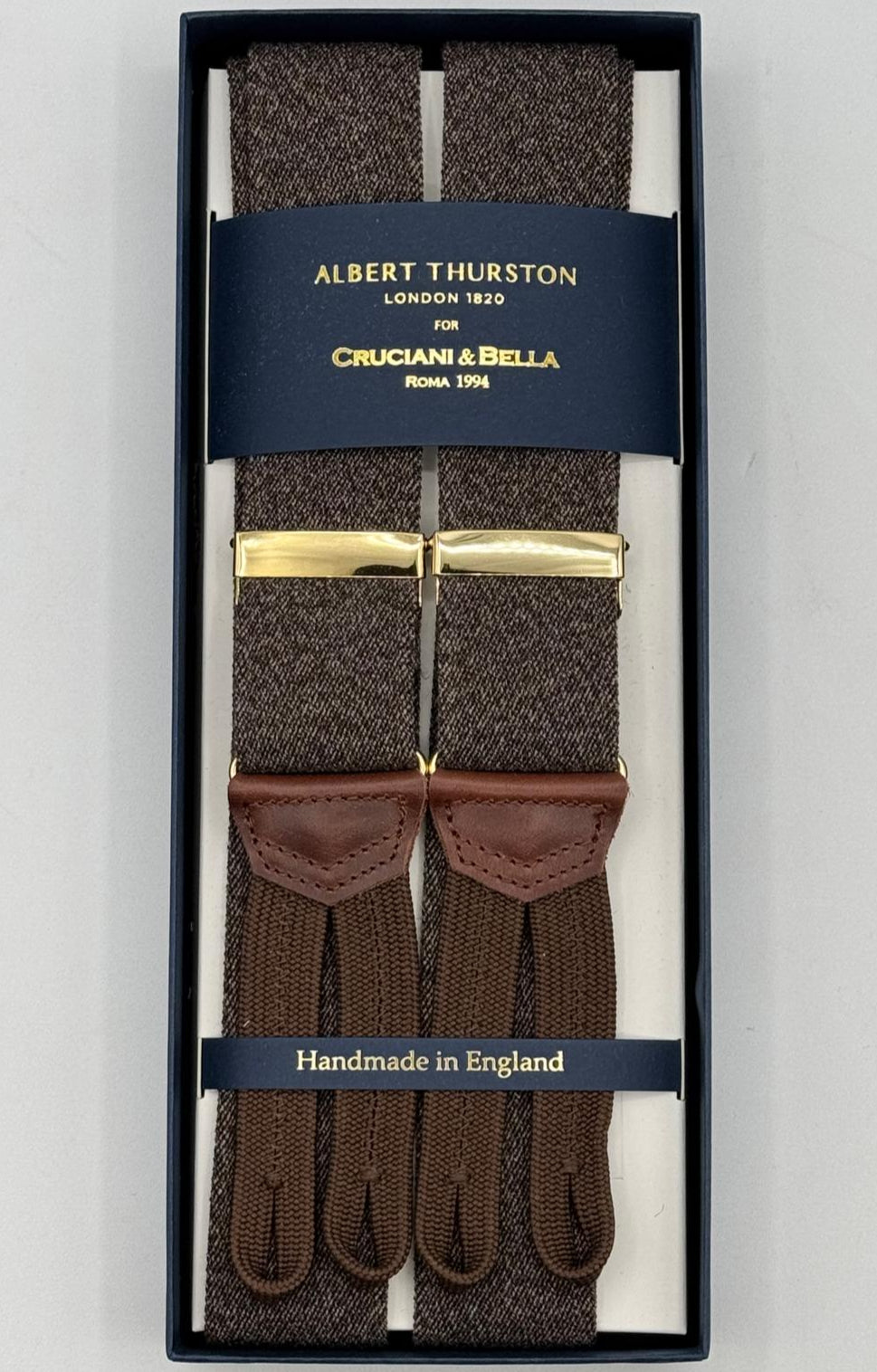 Albert Thurston for Cruciani &amp; Bella
Made in England
Adjustable Sizing
35 mm elastic Brown Plain Melange Braces
Braid ends
Y-Shaped
Gold Fittings
Size Multifit Adjustable&nbsp;Length:&nbsp;115cm (= 45 inch) Maximum