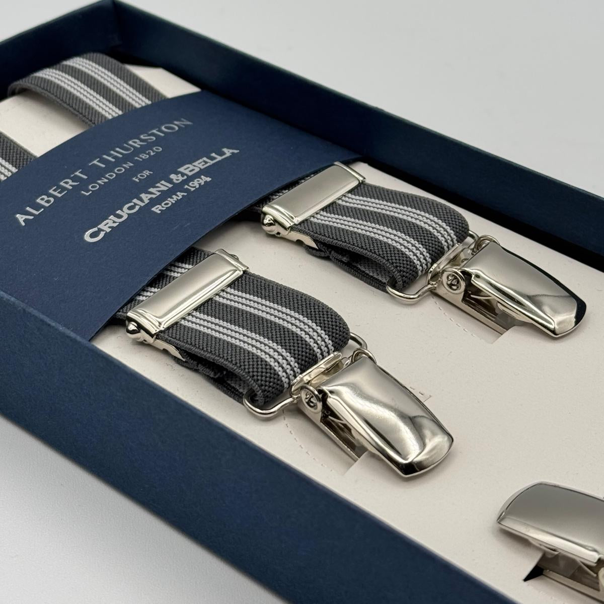 Albert Thurston for Cruciani &amp; Bella

Made in England
Clip on
Adjustable Sizing
25 mm elastic braces
Grey, White Stripes
X-Shaped
Nickel Fittings
Size: L