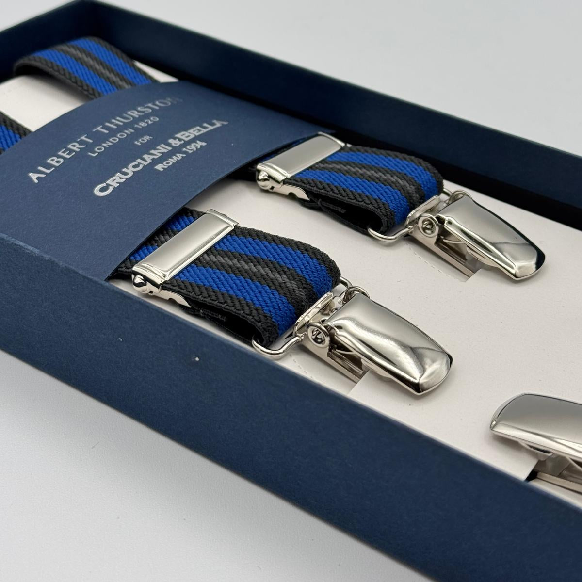 Albert Thurston for Cruciani &amp; Bella

Made in England
Clip on
Adjustable Sizing
25 mm elastic braces
Blue, Light Blue Stripes
X-Shaped
Nickel Fittings
Size: L