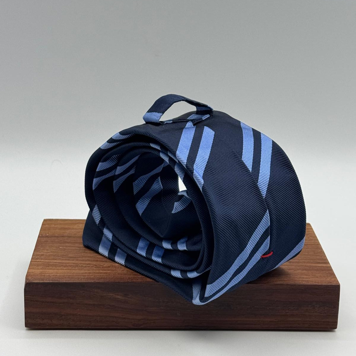 Cruciani &amp; Bella
100% Silk&nbsp;
Unlined
Brown Tie
Blue and Light Blue Stripes Tie
Handmade in Italy
7,5 cm x 148 cm
New Old Stock