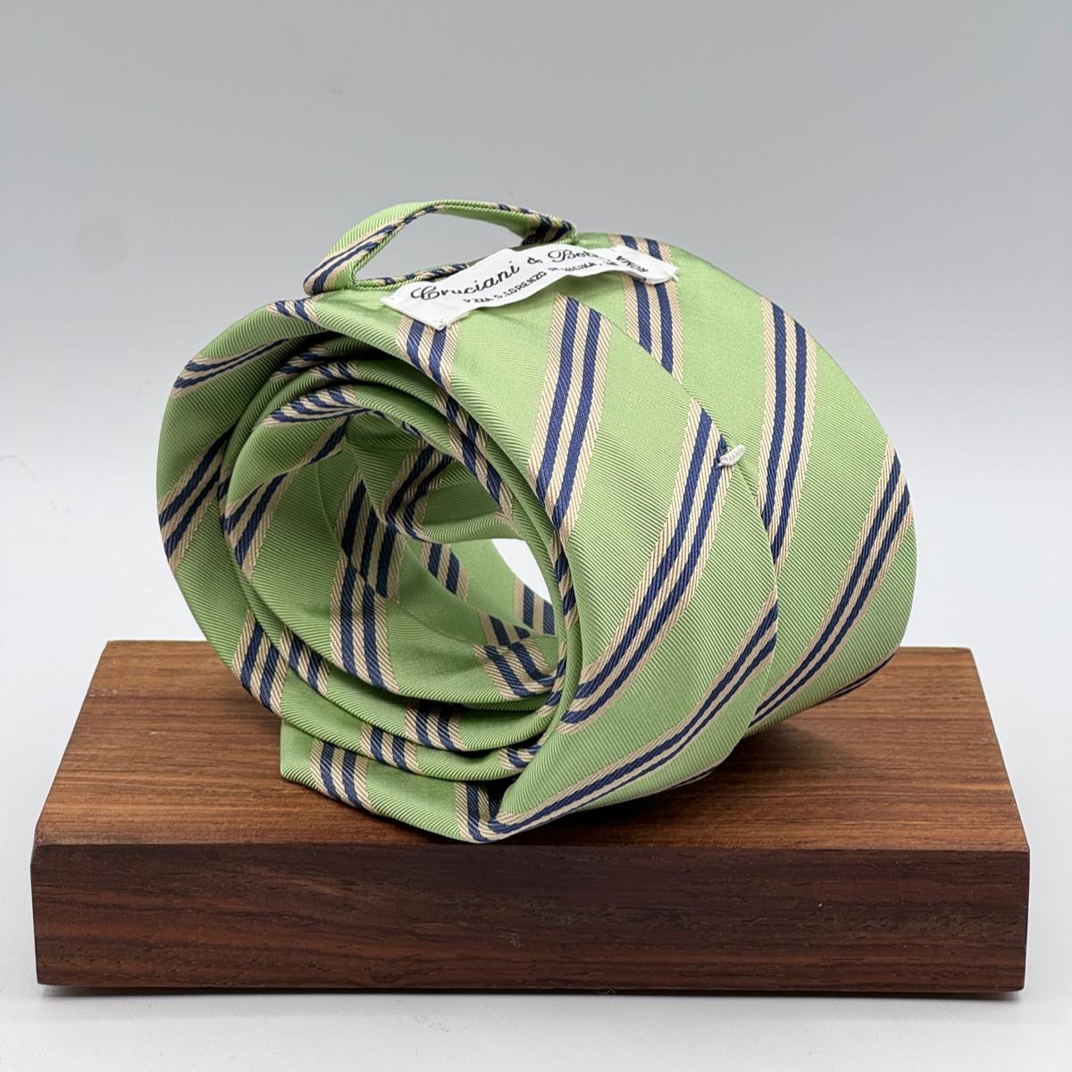 Cruciani &amp; Bella
100% Woven Silk&nbsp;

Self Tipped&nbsp;
Blue, Light Blue and Beige stripes

Handmade in Italy
8 cm x 148 cm
New Old Stock