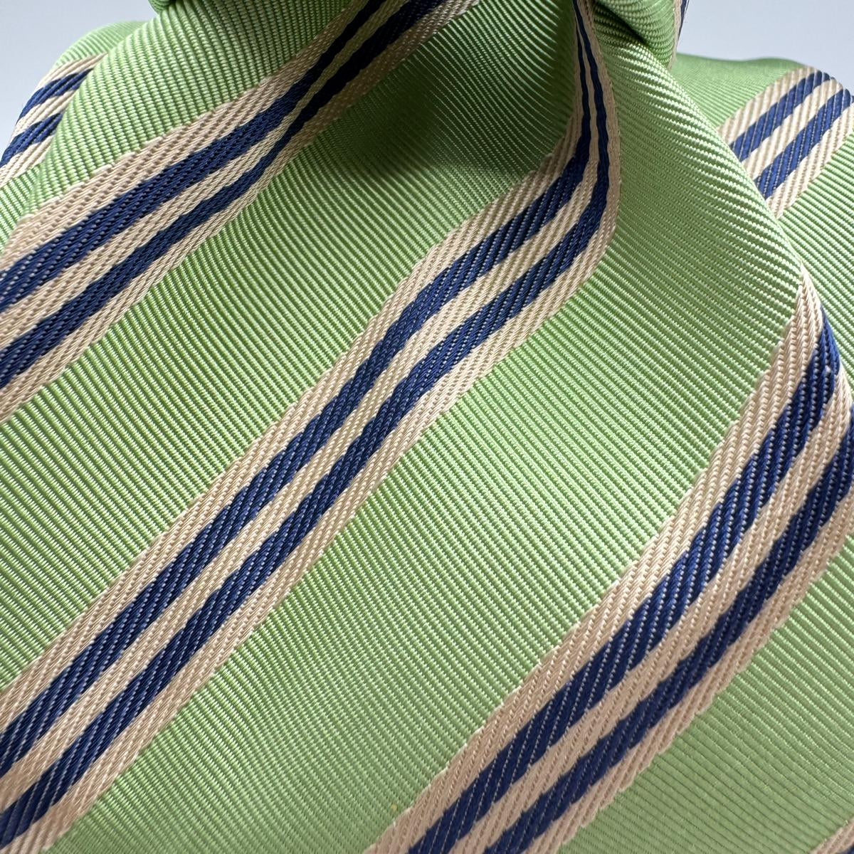 Cruciani &amp; Bella
100% Woven Silk&nbsp;

Self Tipped&nbsp;
Blue, Light Blue and Beige stripes

Handmade in Italy
8 cm x 148 cm
New Old Stock
