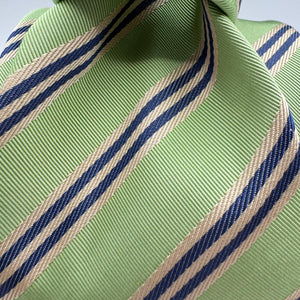 Cruciani &amp; Bella
100% Woven Silk&nbsp;

Self Tipped&nbsp;
Blue, Light Blue and Beige stripes

Handmade in Italy
8 cm x 148 cm
New Old Stock