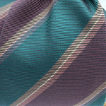 Cruciani &amp; Bella
100% Silk&nbsp;
Woven Jaquard
Self Tipped&nbsp;
Red Wine, Green, Brown and Beige Stripes
Handmade in Italy
9 cm x 148 cm
New Old Stock