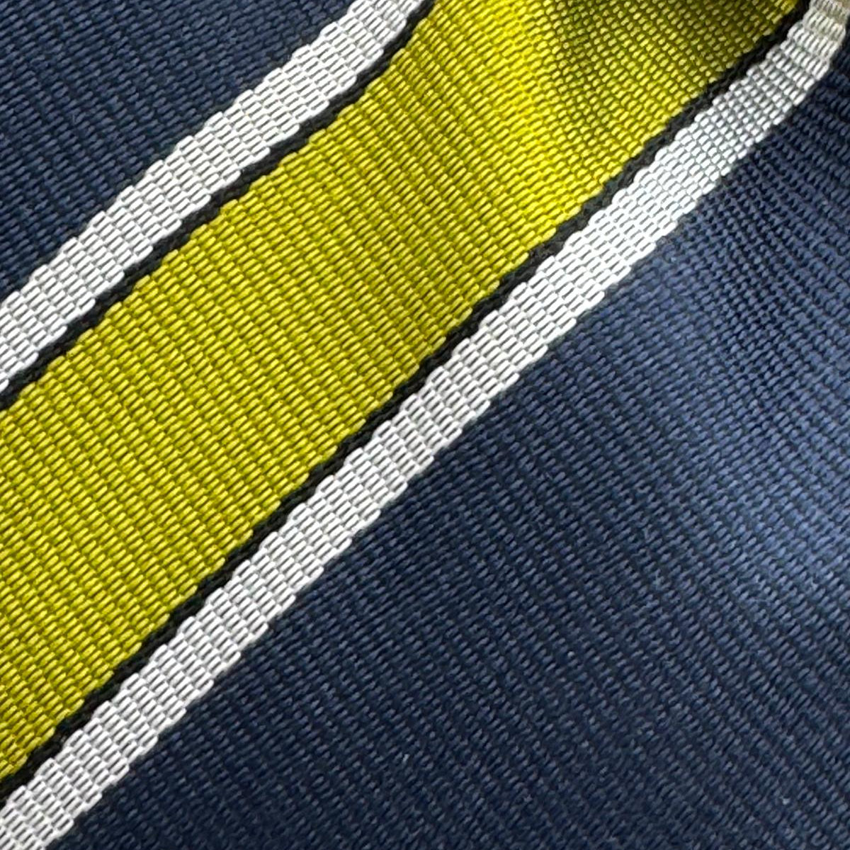 Cruciani &amp; Bella
100% Silk&nbsp;
Woven Jaquard
Self Tipped&nbsp;
Blue, Green, and White Stripes
Handmade in Italy
9 cm x 148 cm
New Old Stock