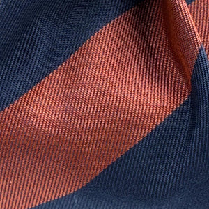 Cruciani &amp; Bella
100% Silk&nbsp;
Woven Jaquard
Self Tipped&nbsp;
Blue and Rust Stripes
Handmade in Italy
9 cm x 148 cm
New Old Stock