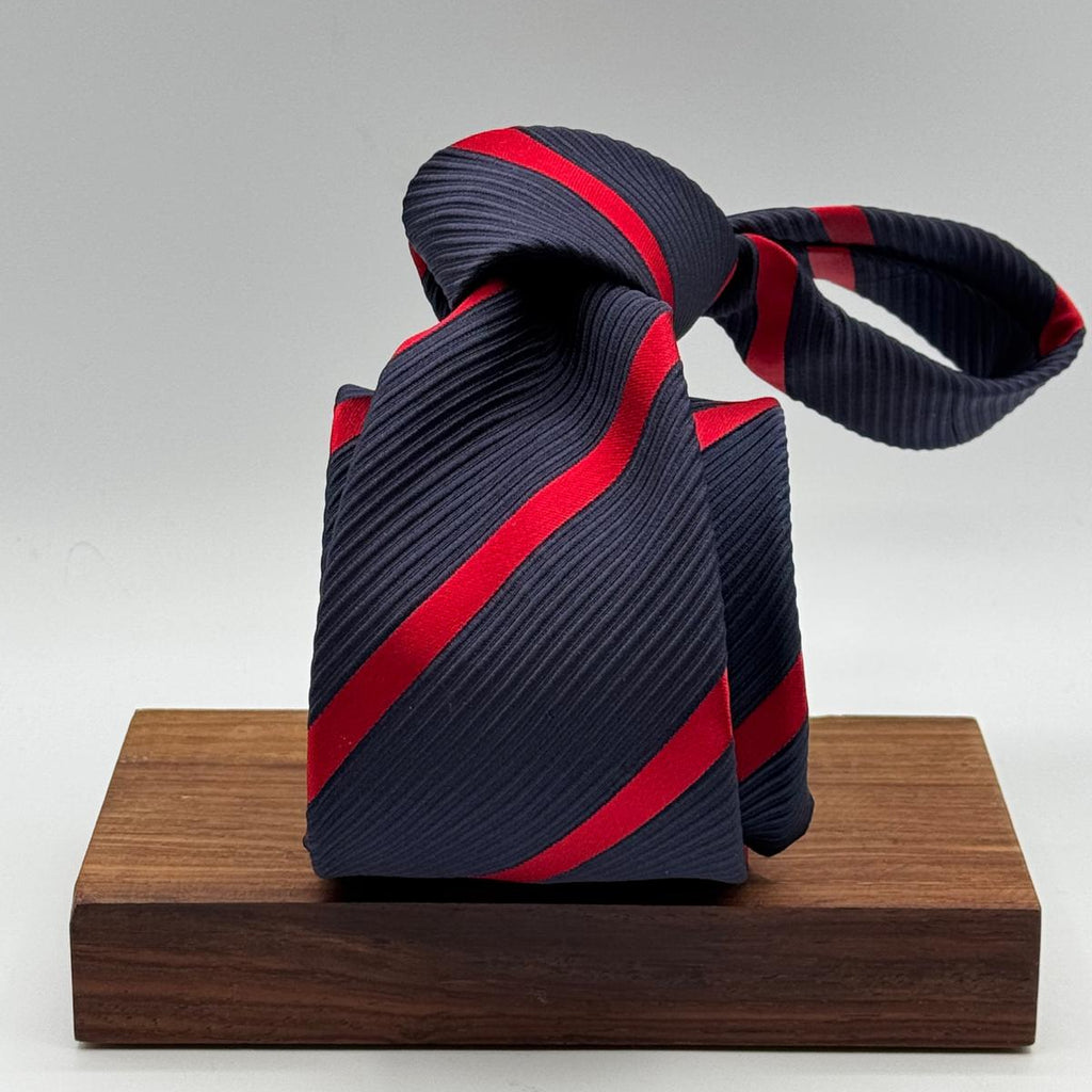 Cruciani &amp; Bella
100% Silk&nbsp;
Woven Jaquard
Tipped&nbsp;
Blue and Red Stripe
Handmade in Italy
9 cm x 148 cm
New Old Stock
