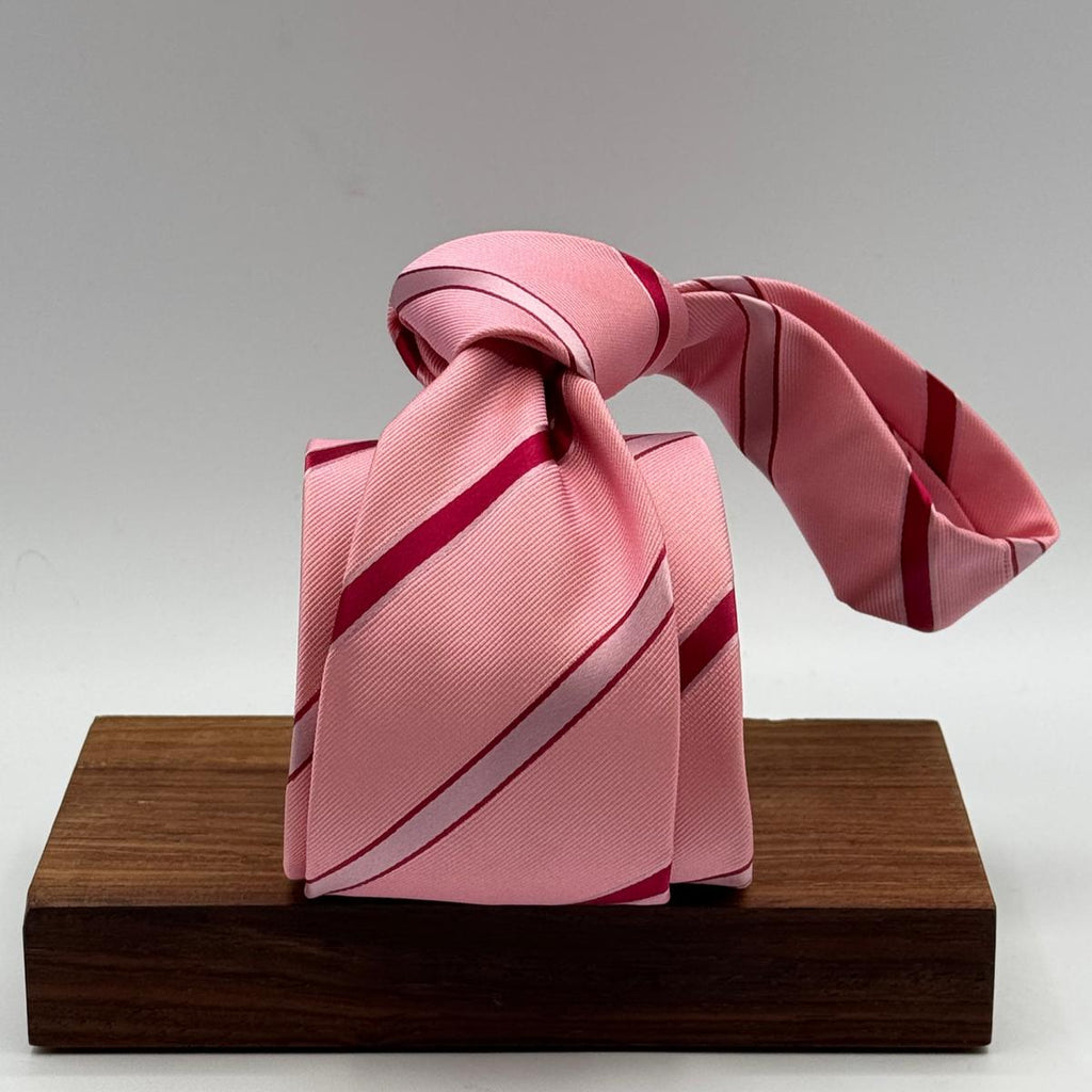 Cruciani &amp; Bella
100% Silk&nbsp;
Woven Jacquard
Tipped&nbsp;
Pink and Cherry Stripe
Handmade in Italy
8,5 cm x 148 cm
New Old Stock
