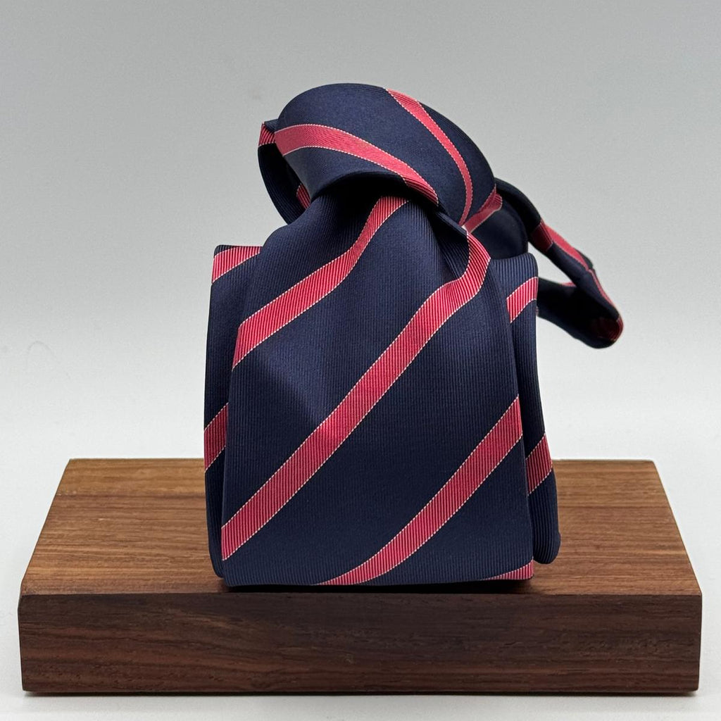Cruciani &amp; Bella
100% Silk&nbsp;
Woven Jacquard
Tipped&nbsp;
Blue and Cherry Stripes
Handmade in Italy
8,5 cm x 148 cm
New Old Stock