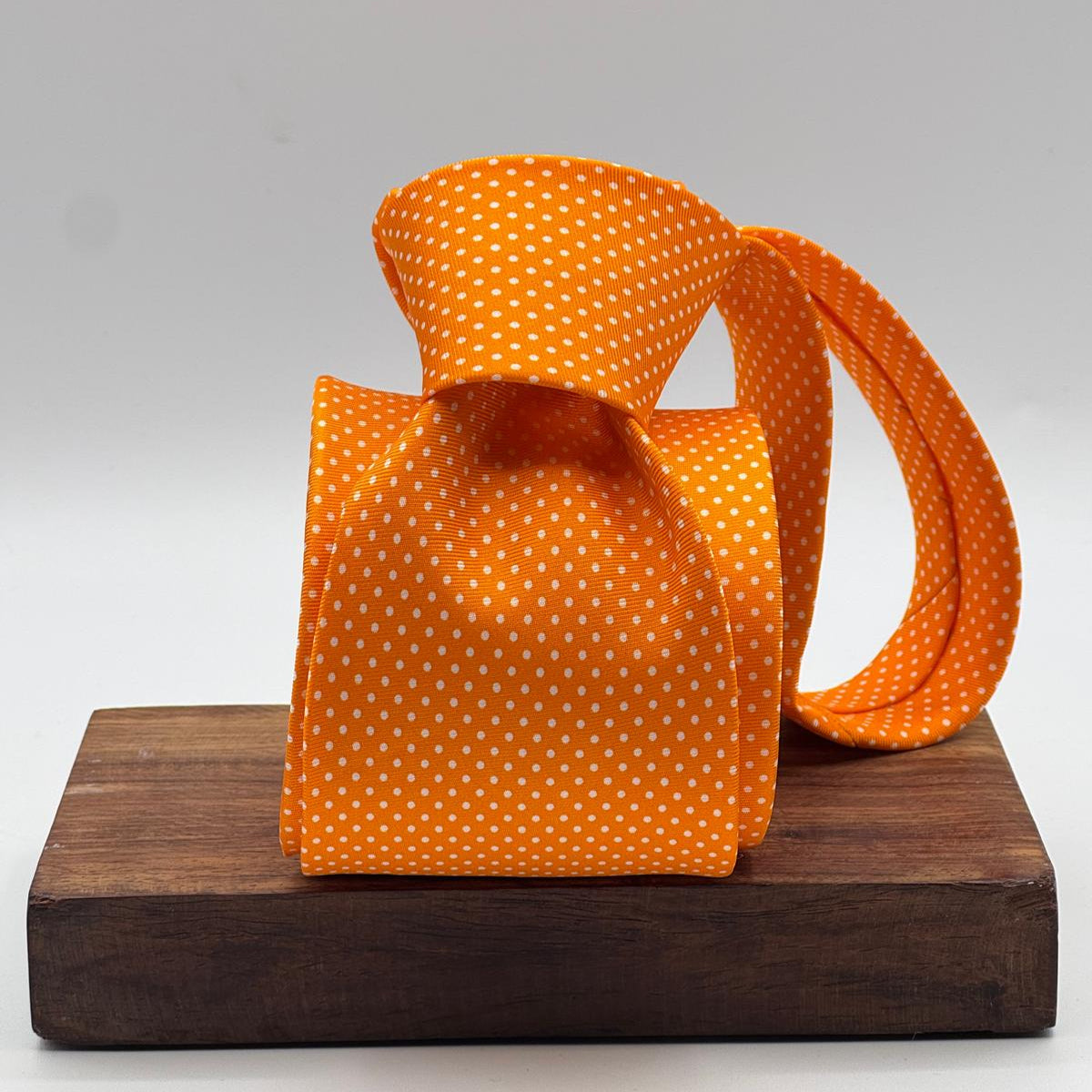 Cruciani &amp; Bella
100% Printed Silk&nbsp;
Tipped
Orange and White Polka Dots Motif Tie
Handmade in Italy
8,5 cm x 148 cm
New Old Stock