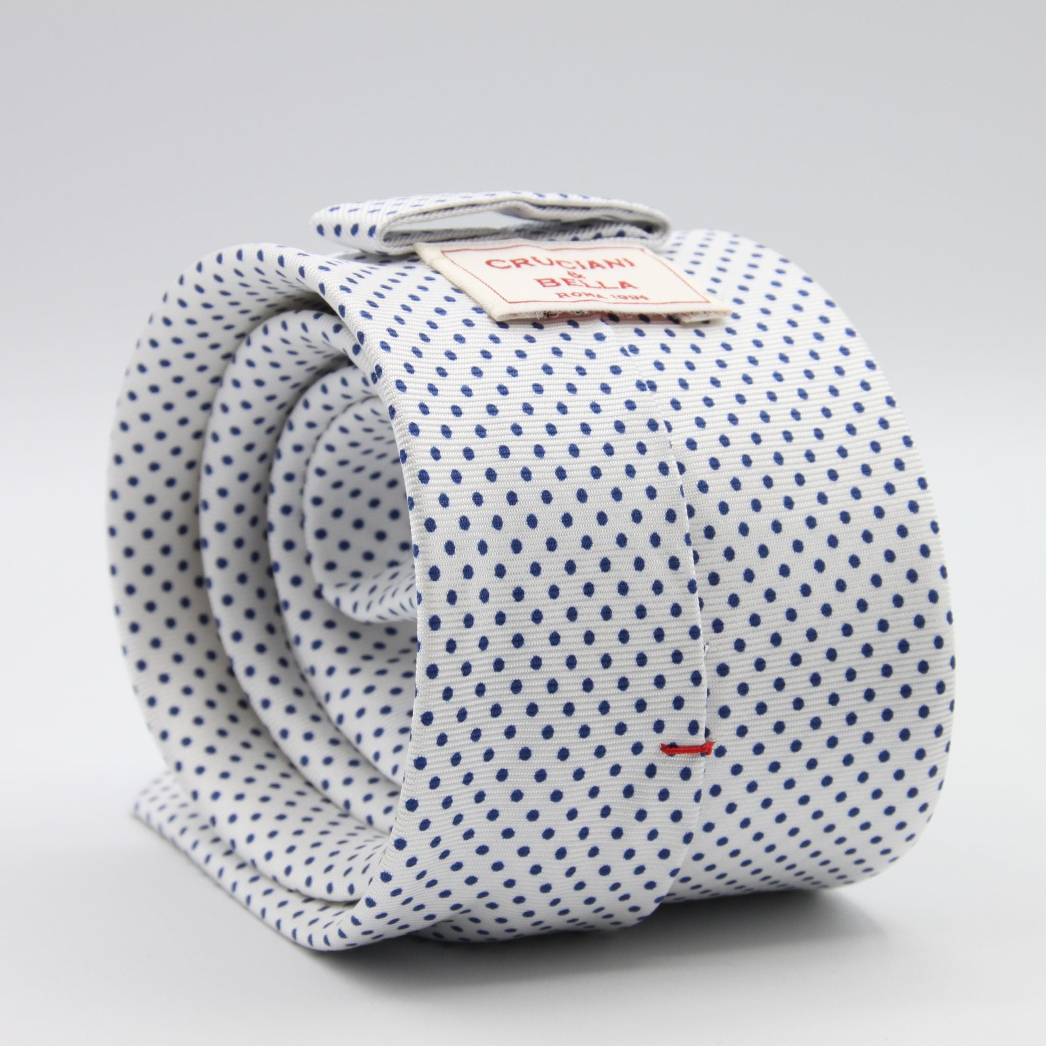 Cruciani &amp; Bella
100% Silk
Printed
Self-Tipped
White, Blue Pin Dots Tie
Handmade in Rome, Italy.
8 cm x 150 cm
#7798