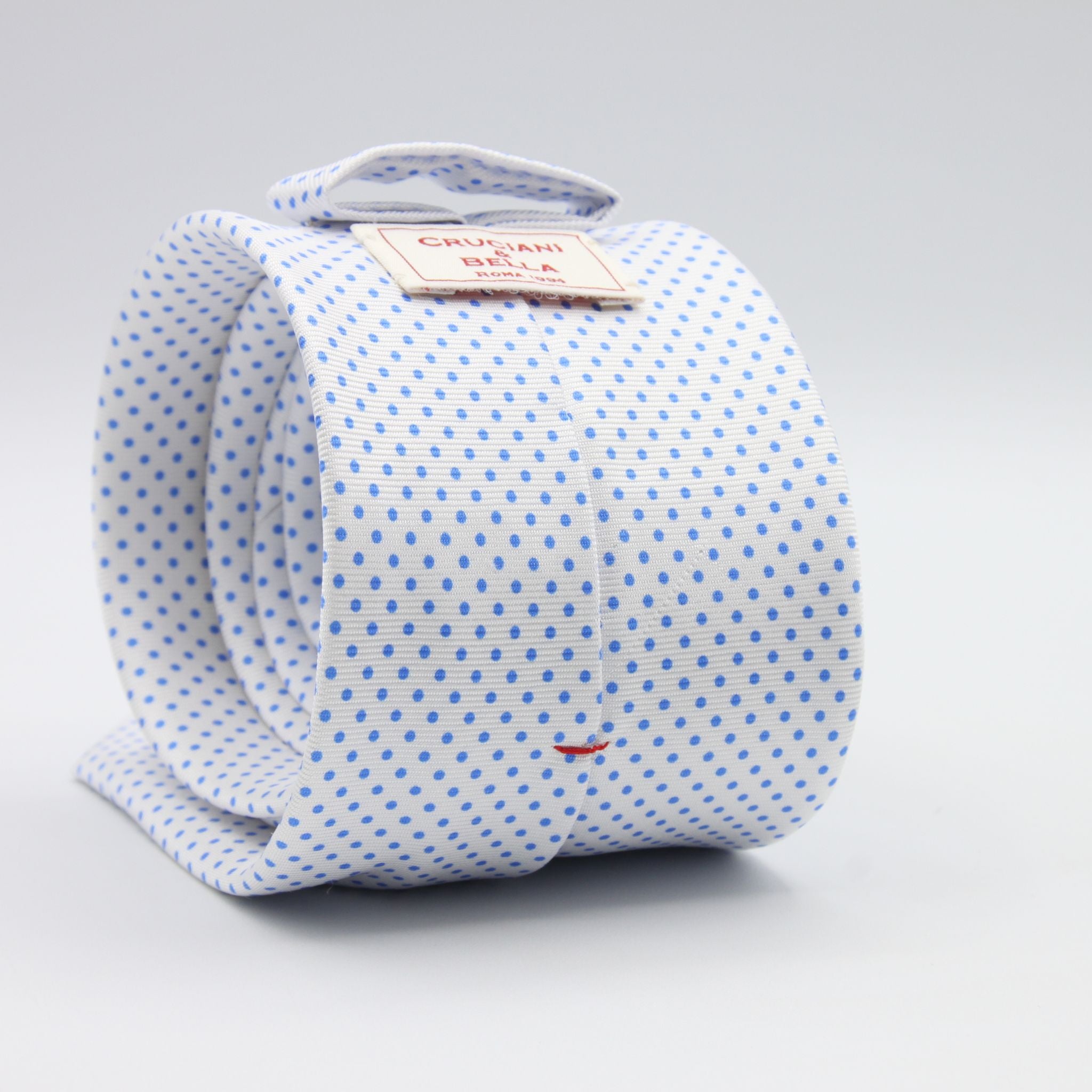 Cruciani &amp; Bella
100% Printed Silk

Self-Tipped
White and Light Blue Pindots Tie&nbsp;
Handmade in Rome, Italy.

8 cm x 150 cm
#8857