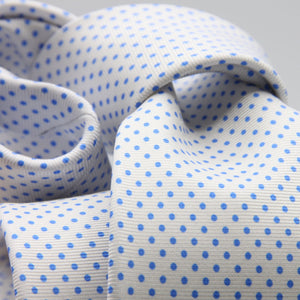 Cruciani &amp; Bella
100% Printed Silk

Self-Tipped
White and Light Blue Pindots Tie&nbsp;
Handmade in Rome, Italy.

8 cm x 150 cm
#8857